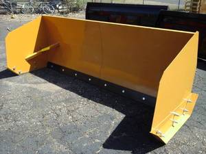 lot 702 image: 8 Snow Pusher (Skid Steer Attachment)