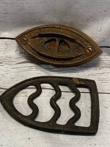 lot 12 image: Antique Colebrookdale Iron & Stand