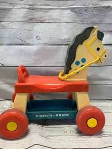 lot 100 image: Fisher Price 1976 Ride On Horse #678 Pull Toy