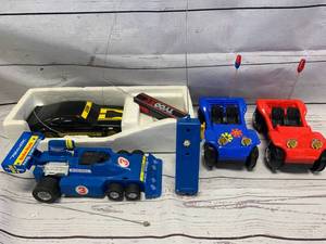 lot 110 image: 2 Remote Control Cars & 2 Battery Operated Dune Buggys