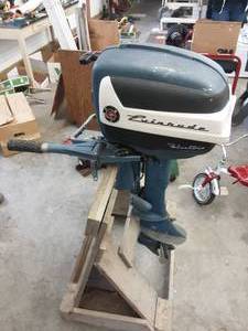 lot 92 image: Evinrude 7.5 Hp Fleetwind With Stand (Has Compression)