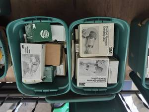 lot 205 image: 2-Totes With Lids With Grinding Discs & Belts.  Removal From Upper Loft.