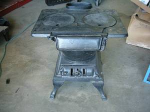 lot 4 image: Cast Iron Woodstove
