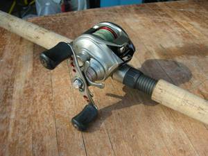 lot 61 image: Okuma - Shimano Baitcast Fishing ReelRod Combo