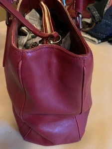 lot 60 image: Red Leather Coach Purse