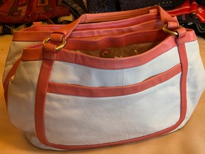 lot 61 image: Leather Off White Coach Purse with Pink Accents