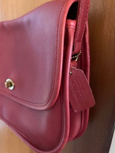 lot 65 image: Red Leather Coach Purse