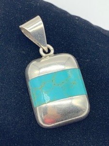 lot 106 image: Sterling Silver and Turquoise Pendant