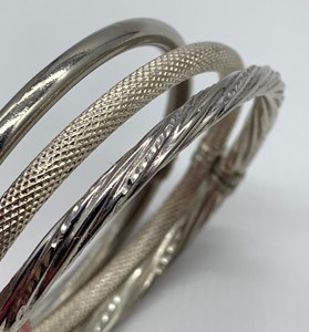 lot 104 image: Three Hinged-Cuff Sterling Silver Bracelets