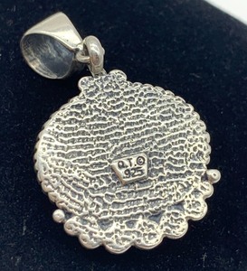 lot 111 image: Amber and Sterling Pendant