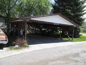 lot 1 image: 1985 Detroit Double Wide Mobile Home With Decks & Additions