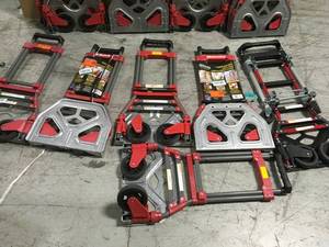 lot 11 image: Pallet with Milwaukee Portable folding dollies customer returns various conditions