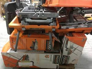 lot 19 image: Pallet with assorted Ridgid Tile saws customer returns various styles and conditions