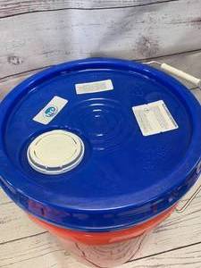 lot 8 image: New 5 Gallon Bucket of Tide Laundry Detergent