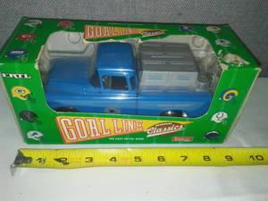 lot 5 image: In box - Carolina Panthers Goal Line Die Cost Bank.