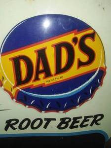 lot 14 image: Dads Metal Root Beer sign