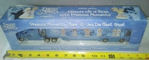 lot 50 image: Enesco Precious moments Semi in box.