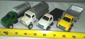 lot 57 image: 4 Utility Farm Trucks - some new with tags.