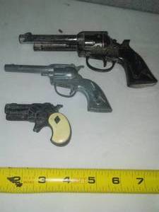 lot 118 image: 3 Vintage toy pistols. Deringer  more