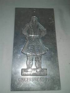 lot 125 image: Ginger bread man metal mold from Virginia