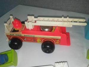 lot 130 image: Fisher Price Fire engine, minibus, people, furniture and more.