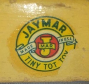 lot 133 image: JAYMAR Tiny Tot Toy Wood Pull toy with many pieces. Vintage.