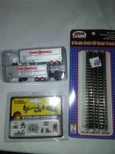lot 145 image: N Scale Model Railroading Scenic Accents, track & semi-tractor trailers. All new
