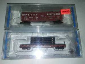 lot 148 image: N Scale Model Railroading 2 New cars flat car with pipe, boxcar  Bachmann Western Maryland.