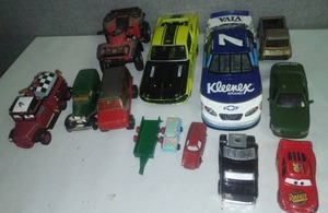 lot 158 image: Mustang, NASCAR # 7 Kleenix, Honda ATV, all metal vehicles.