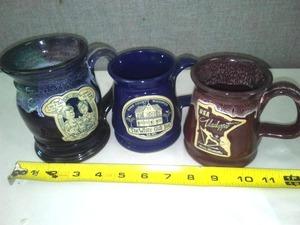 lot 160 image: 3 collectible mugs - Vasaloppet - Mora, White Gull Inn, WI. Puke & Snot