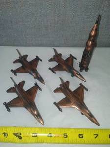lot 165 image: 4 planes & Rocket metal brass colored pencil sharpener.