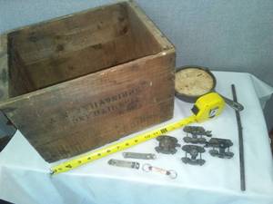 lot 166 image: Vintage wood box ,cast skillet.