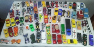 lot 216 image: About 75 hot wheels & similar.