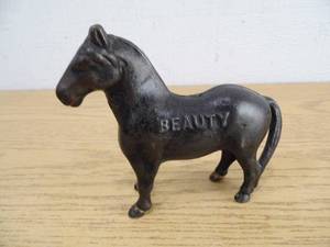 lot 78 image: Cast Iron Beauty Horse Bank