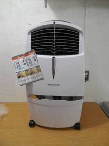 lot 91 image: Honeywell 525 CFM 3-Speed Indoor Portable Evaporative Air Cooler for 320 sq. ft. in White