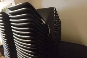 lot 65 image: (25) Black stacking chairs