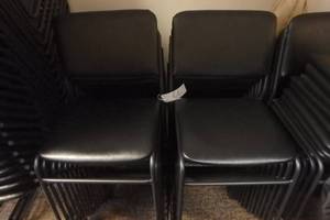 lot 66 image: (25) Black stacking chairs