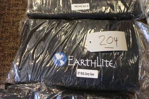 lot 204 image: Earth Lite Table Bag