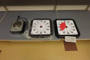 lot 279 image: (2) timers, clock radio