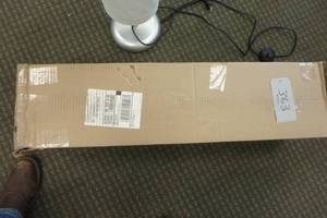 lot 363 image: Large roll of exam table paper