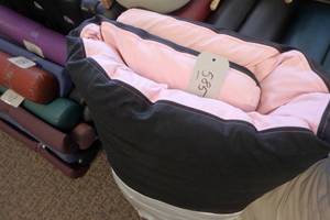 lot 585 image: Fancy black and pink Shiatsu mat