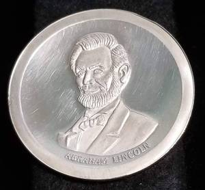 1 TROY OZ. .999 FINE SILVER LINCOLN CONCAVE ROUND