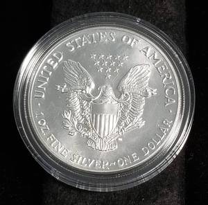 1987 AMERICAN SILVER EAGLE 1 TROY OZ. .999 FINE SILVER IN AIRTITE