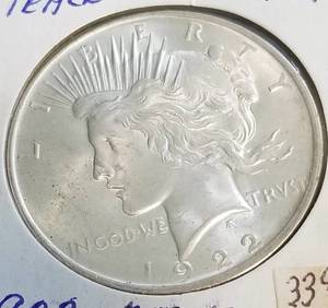 1922 PEACE SILVER DOLLAR IN HIGHER GRADE