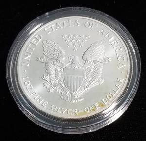 1990 AMERICAN SILVER EAGLE 1 TROY OZ. .999 FINE SILVER IN AIRTITE