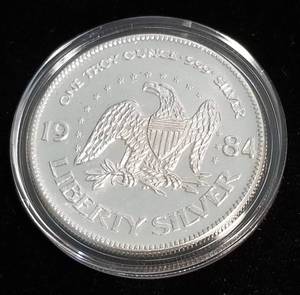 1 TROY OZ. .999 FINE SILVER 1984 A-MARK LIBERTY ROUND IN AIRTITE