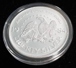 1 TROY OZ. .999 FINE SILVER 1984 A-MARK LIBERTY ROUND IN AIRTITE