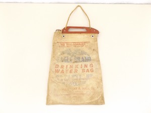 lot 5 image: Antique Eagle Brand Canvas Automobile Water Bag