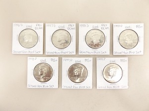 lot 69 image: Lot of 7 High Grade U.S. Mint Kennedy Half Dollars