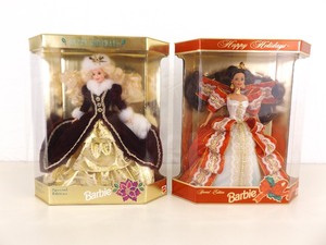 lot 86 image: NEW 1996 and 1997 Holiday Barbies 